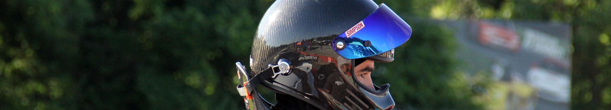 Simpson Racing helmets, suits, and professional motorsports safety gear used in auto racing applications