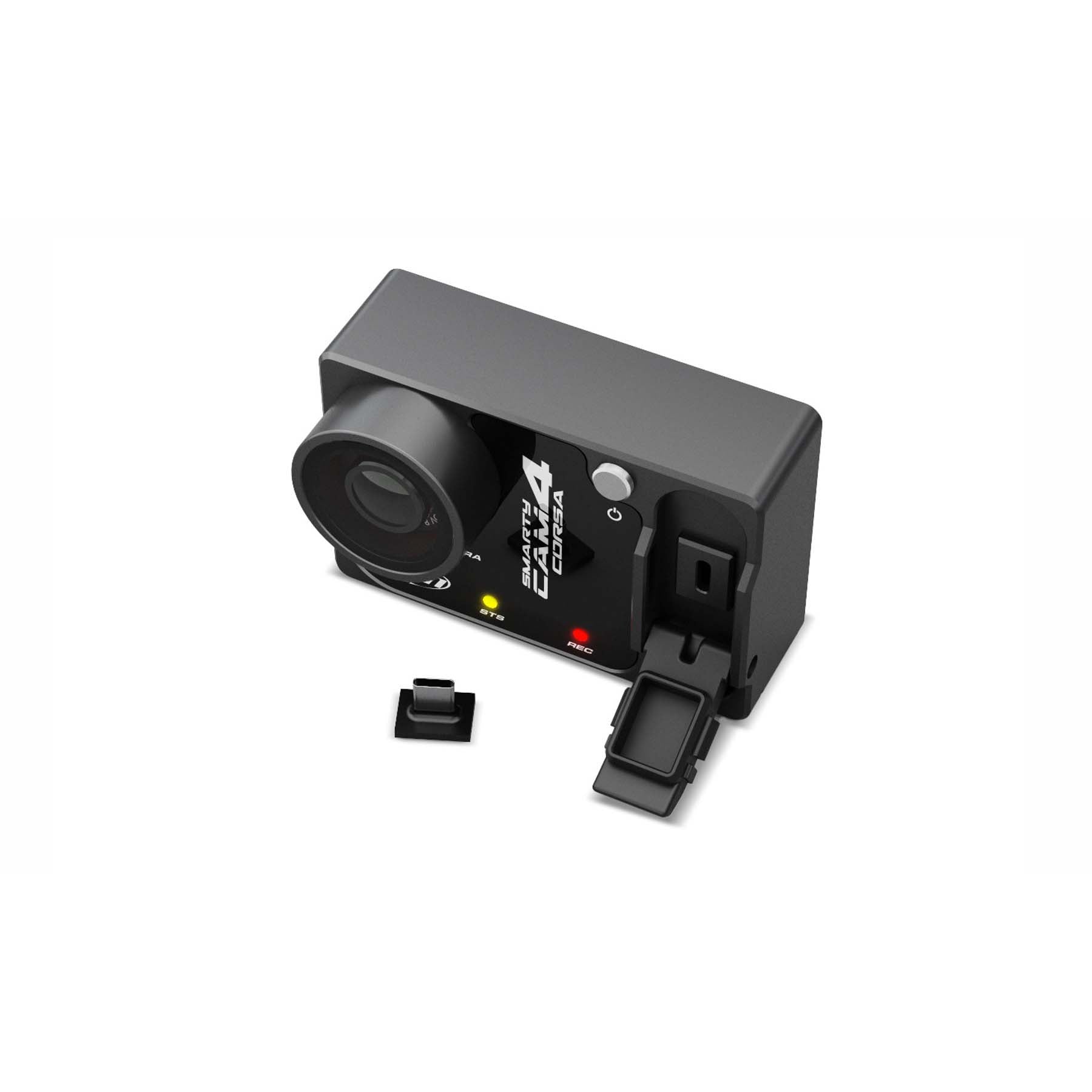 Camera with accessory door open:
AiM SmartyCam 4 Corsa with side access door open, showing USB-C port and memory card slot